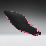 A single pointed-toe shoe shown floating against a dark-to-light gray gradient background. The upper is black with a pink and black spotted pattern around the edges and heel.