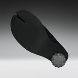A black split-toe shoe sole with a textured surface and a translucent gray decorative end cap, shown on a dark-to-light gray gradient background.