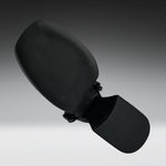 A black car side-view mirror assembly with a textured plastic housing and a mesh-covered mounting bracket, shown against a dark-to-light gray gradient studio background.