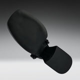 A black car side-view mirror assembly with a textured plastic housing and a mesh-covered mounting bracket, shown against a dark-to-light gray gradient studio background.