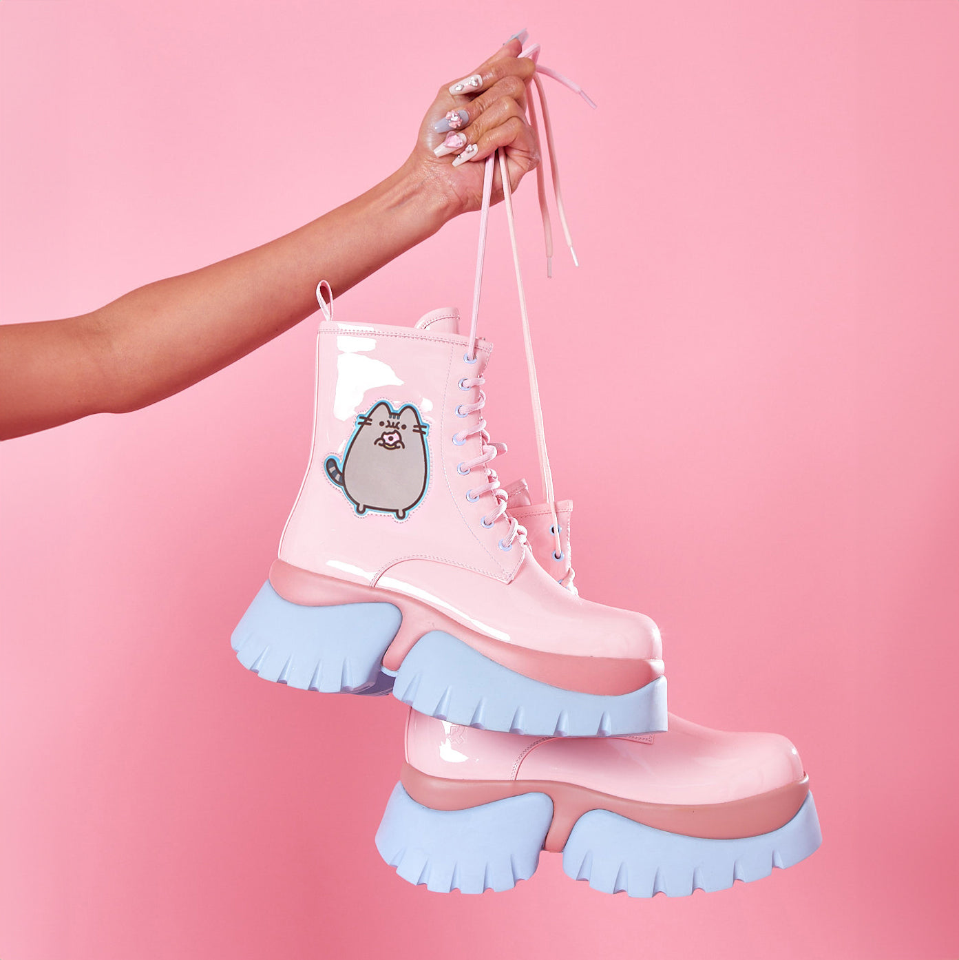 Pusheen Doughnuts Pastel Patent Boots - Ankle Boots - KOI Footwear - Pink - Model Holding Boots