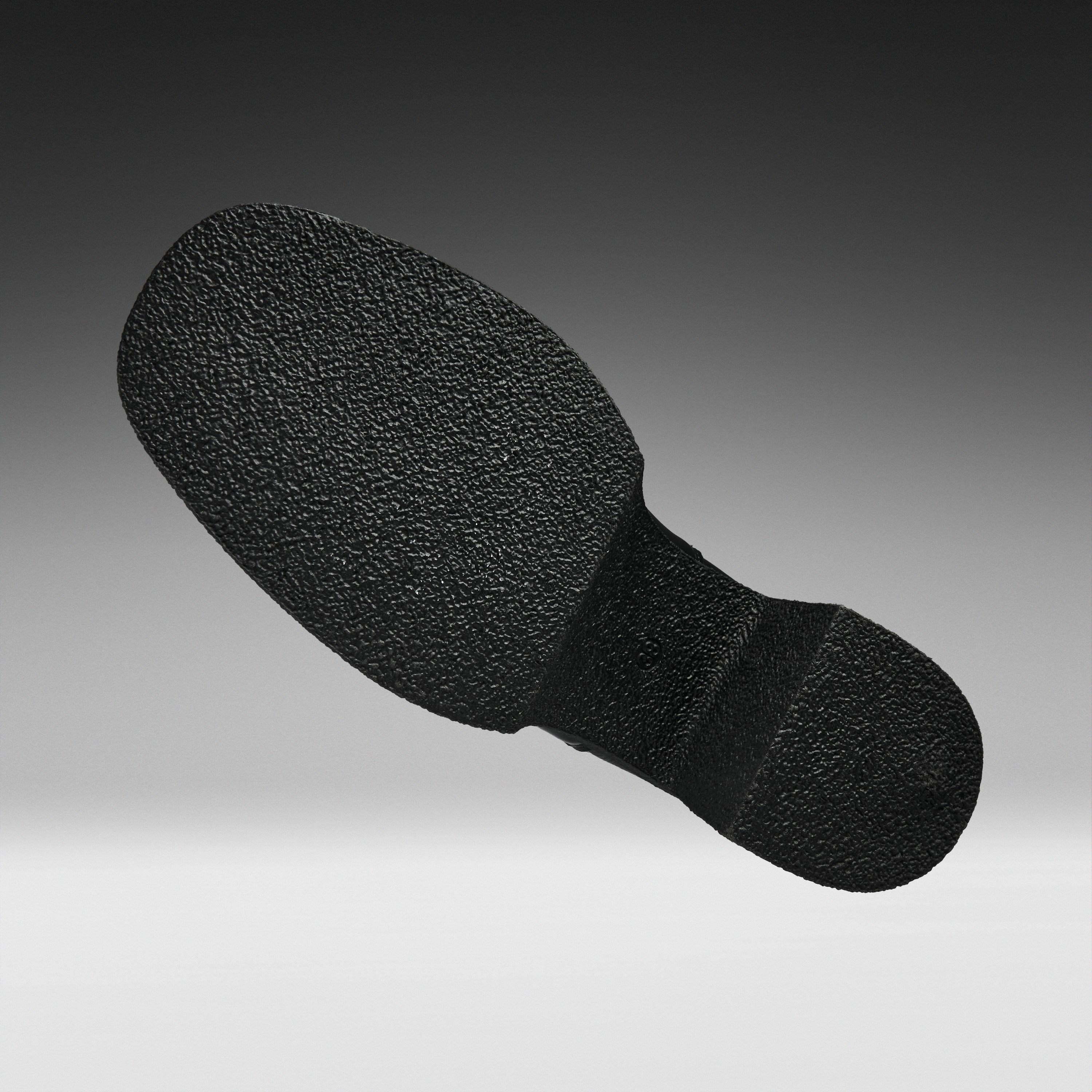 A black textured shoe sole shown floating against a gradient gray background.