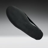 A black shoe insole shown floating against a gradient gray background.