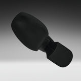 A black textured headrest or support cushion with a curved top section and a rectangular base, shown floating against a dark-to-light gray gradient background.